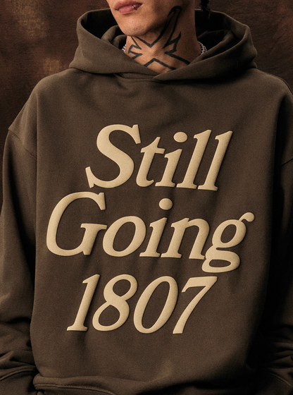 1807 STILL GOING Foam Print Hoodie