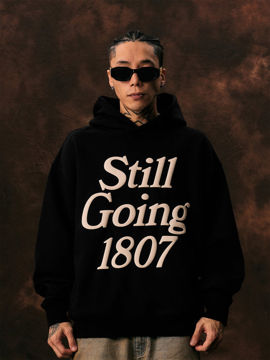 1807 STILL GOING Foam Print Hoodie